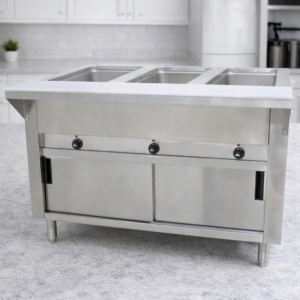 MESA CALIENTE ELECTRICA BANO MARIA ADVANCE TABCO TIPO GABINETE CERRADO CON PUERTAS EN ACERO INOXIDABLE PARA 3 INSERTOS 208/240V, DE 1,000W MEDIDAS: 43 3/8 X 30 3/16 X 34 PG CON TABLA DE CORTE CON REGATONES NIVELADORES