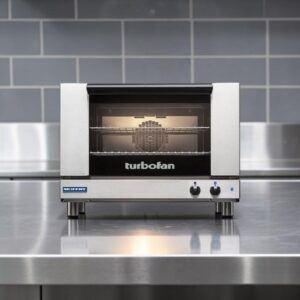 Horno De Conveccion Electrico Moffat E27M2-T de una sola cubierta, tamai±o completo, con turboventilador, 2 bandejas y controles mecanicos, 220-240 V, monofasico, 3 kW